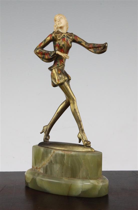 Attributed to Josef Lorenzl. An Art Deco cold painted bronze and ivory figure of a dancer, 8in.